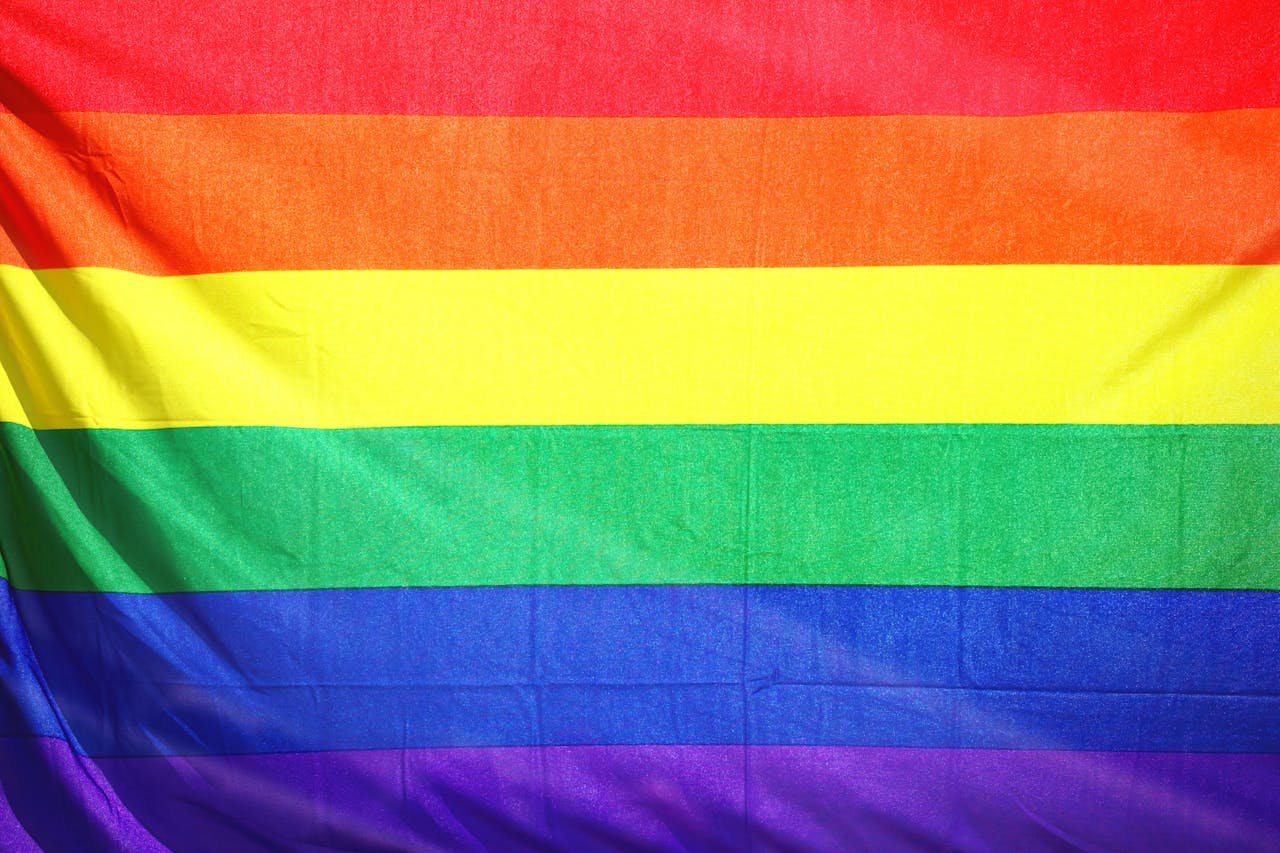 Close-up of a colorful rainbow flag symbolizing LGBT pride and diversity.